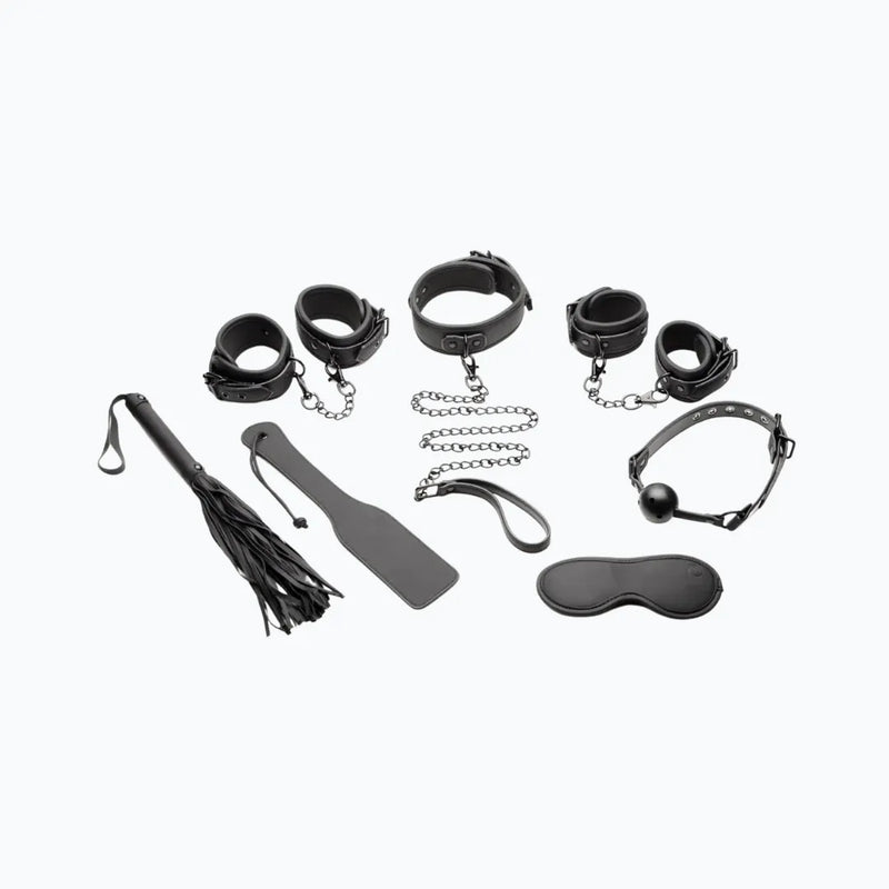 Black_BDSM_bondage_kit_with_cuffs_chains_paddle_whip_ball_gag_and_blindfold